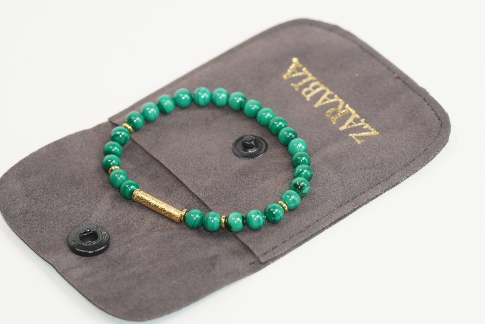 Malachit mit Silber/Gold-Schmuck